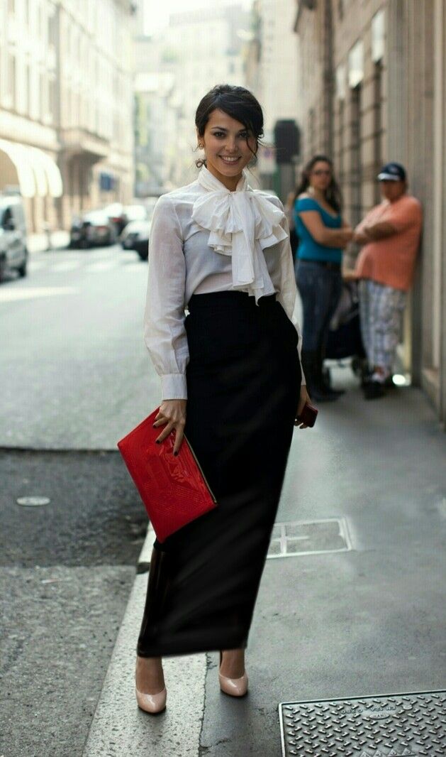 Lady models in white blouse and black pencil skirt 